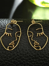 Load image into Gallery viewer, '1 pair of Hollow Face Design Drop Earrings' Highly on trend, this couple of earrings, with a modern graphic figure/face design, are on high demand! Beautiful fashion accessories, it is a perfect gift for earrings lovers or collectors.