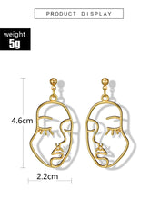 Load image into Gallery viewer, '1 pair of Hollow Face Design Drop Earrings' Highly on trend, this couple of earrings, with a modern graphic figure/face design, are on high demand! Beautiful fashion accessories, it is a perfect gift for earrings lovers or collectors.