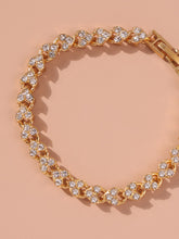 Load image into Gallery viewer, 'Rhinestone Heart Charm Bracelet' A high-polish bracelet composed of interlinked rhinestone heart charms and a lobster-clasp closure. Add a touch of elegance to your outfit with this glam fashion accessory! Metal Color: Gold Material: Alloy Color: Gold, shiny and cute Type: Link Details: Heart, Rhinestone Style: Casual Length: 17.5 cm