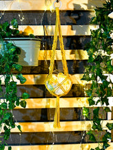 Load image into Gallery viewer, '1pc Macrame Plant Hanger' - This hanger can contain flowers or plants pot, making any environment trendy and ecological! Create your indoors garden with it! Reminder: make sure you do not weigh the container too heavy and hang it properly!'      Colour: Yellow     Type: Wall Hanging     Material: Polyester     Size. Height (63cm/24.8 inch)     Bowl container and candles included     Flowers, stones and hanging accessories not included