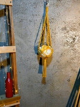 Load image into Gallery viewer, '1pc Macrame Plant Hanger' - This hanger can contain flowers or plants pot, making any environment trendy and ecological! Create your indoors garden with it! Reminder: make sure you do not weigh the container too heavy and hang it properly!'      Colour: Yellow     Type: Wall Hanging     Material: Polyester     Size. Height (63cm/24.8 inch)     Bowl container and candles included     Flowers, stones and hanging accessories not included