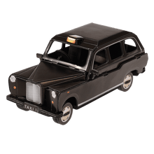Load image into Gallery viewer, Make your own iconic London taxi with this cardboard craft kit! It comes with 37 pieces and instructions to help build the model. Model measurements are as follows:      Dimensions: Width 7cm Height 7cm Length 18cm     Material: Paper     Gift idea. British Souvenir. London Landmarks collection 3D toys.