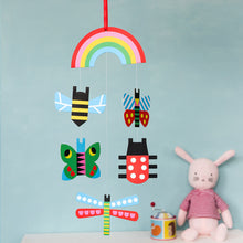 Load image into Gallery viewer, 'If you are looking for a colourful way to decorate the children's cots, this cardboard 'bugs' baby mobile with high contrast colours, exclusive design (with butterflies, bees and lady birds), will add a lovely touch of sweetness to your kid's room!'      Includes hanging ribbon     Length (inc. ribbon): 48cm     Width (widest point): 15cm     Caution: Choking hazard. Hang this mobile out of the reach of children. This item is a decoration, not a toy.