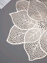 Load image into Gallery viewer, '2 pieces - Stylish Leaf and Lotus Shaped Hollow Placemats' a table accessory to decorate the tables of beautiful and charming houses!      Colour: Gold & Champagne     Pattern Type: Floral     Type: Placemat     Material: PVC/ Plastic