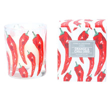 Load image into Gallery viewer, A beautifully presented scented candle, wonderfully illustrated red hot chilli. Great gift for lovers of spice and candle collectors! Give a strong tone of colour and scent of spicy orange chilli to your home!   Scent: Orange & Chilli seed Dimensions 8.5x9.5x8.5cm Product Weight 536 g Composition: 45% Glass 45% Paraffin Wax 10% Paper Burn Time : 20Hrs Use it with caution (never leave a candle lit without supervision - keep away from children)!