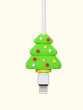 Load image into Gallery viewer, This Christmas, do not give up being highly tech! Get this cute data cable protector (Christmas Tree design) for mobile phone charger. During the holidays, show this accessory for technological devices to your friends, they will love it! Color: Green Pattern Type: Christmas Type: Cables Protectors Material: Silica gel Size: Length 3cm (1.2 inch) X Width 3cm (1.2 inch) X Height 1.2cm (0.5 inch)
