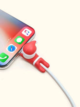 Load image into Gallery viewer, This Christmas, do not give up being highly tech! Get this cute data cable protector (Santa Claus Father Christmas design) for mobile phone charger. During the holidays, show this accessory for technological devices to your friends, they will love it!  Color: Red and White Pattern Type: Christmas Type: Cables Protectors Material: Silica gel Size: Length 4cm (1.6 inch) X Width 2cm (0.8 inch) X  Height 2.5cm (1 inch)