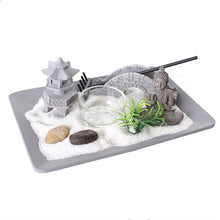 Load image into Gallery viewer, Perfect for helping to achieve a sense of zen both at home and in the office, this Zen Garden includes gravel, pebbles, a mini rake, ornaments and a candle holder. You can arrange the set as you like and will achieve a sense of calm once complete. Home decor item and gift idea. Purpose: Relax, meditation, Spa, prayer Size: Height 14 cm Width 19 cm Diameter 4.5 cm Weight: 499g