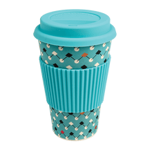 Load image into Gallery viewer, This eco-friendly travel mug comes in a bold Atomic Blue design, and is made from bamboo fibre. Complete with a silicone lid and sleeve to prevent spillages and protect hands.