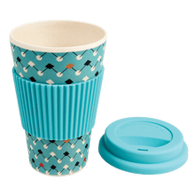 Load image into Gallery viewer, This eco-friendly travel mug comes in a bold Atomic Blue design, and is made from bamboo fibre. Complete with a silicone lid and sleeve to prevent spillages and protect hands.