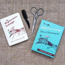 Load image into Gallery viewer, A fun novelty gift for any bearded gent: a product that cannot be missing in the bag of a traveller who loves self-care. A gift loved by the Hipsters! This elegant old fashioned Departure Lounge design grooming kit contains:  1 x scissors, 1 x plastic comb, 1 x instructions leaflet. Dimensions: Length 11 cm Width 8 cm Material: Metal, Card, Plastic.  Travel kit / Man accessories / hairstyle and beard beauty selfcare