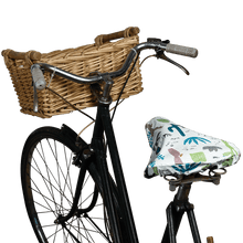Load image into Gallery viewer, Say goodbye to plastic bags on bike seats in the rain! An original funny design with hand drawn succulent and cactus illustrations, this elasticated Desert in Bloom waterproof saddle cover is both pretty and functional. Size of cover: 23cm (width) x 24.5cm (length) One size fits all. Material: Card, Plastic, Elastic Dimensions: Length: 35 cm Height: 0.5 cm Width: 26.5 cm. Cyclists riders lovers gift idea.