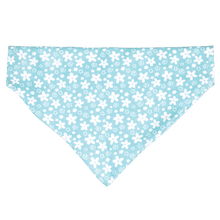 Load image into Gallery viewer, 'Turquoise Ditsy Floral Dog Bandana' Ensure your dog stands out from the pack with our fun slip on bandana, from the Four Legged Friends range. Simply pop this ditsy floral print dog bandana onto your dog's collar for instant style! Suitable for medium and large dogs.      Machine washable     100% cotton     Also available in paisley, polka dot, and paw and cross bones designs.     Large size (Length: 17 cm Width: 24 cm)