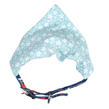 Load image into Gallery viewer, 'Turquoise Ditsy Floral Dog Bandana' Ensure your dog stands out from the pack with our fun slip on bandana, from the Four Legged Friends range. Simply pop this ditsy floral print dog bandana onto your dog's collar for instant style! Suitable for medium and large dogs.      Machine washable     100% cotton     Also available in paisley, polka dot, and paw and cross bones designs.     Large size (Length: 17 cm Width: 24 cm)