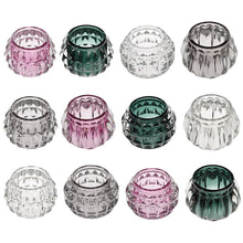 Load image into Gallery viewer, '4 pcs /set of four assorted stylish art deco tea light holders perfect for mantelpieces and as table decorations. Beautify your bathroom with this set during a relaxing bath and create a romantic or relaxing atmosphere with a touch of modernity!      Colours: Clear, Grey, Green, Pink     Material: Heavy Glass     The item comes in a gift box     Scented candles included     Warning: Never leave a candle burning unattended or near flammable objects!