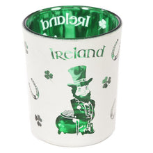 Load image into Gallery viewer, '2 pcs - Lucky Leprechaun Ireland set of 2 glass tea light votive holders' This article has a bicolour tone (white and green) with a lovely design. It is a perfect gift for St. Patrick's day lovers'.      Material: Metallic, Glass     Number in Set: 2     For Use With: Tea Light or Votive Candle     Candle Included: Yes     Dimensions: Height 6.5cm Width 5cm Depth 5cm