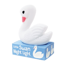 Load image into Gallery viewer, Relax in company of this adorable Little Swan night light, a perfect accessory for peaceful sleep in a sweet dream night. Put it on the bedside table or in a place where you need a soft light. Beloved article both children and adults as this swan has a nice and elegant style at the same time.      Requires 3 x LR44 batteries (included)     WARNING! Choking hazard; not for children under 3 years old     Material: Plastic     Dimensions: Length 11 cm Height 12.5 cm Width 7.5 cm