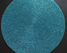 Load image into Gallery viewer, '2 Beaded Placemats' Made using good quality glass beads, this set is easy to clean - simply wipe with a damp cloth. This stunning silver beaded placemat set will add a touch of contemporary glamour to your dining table, making any occasion feel special! Combining elegance with practicality, nice quality glass beads are woven onto a fabric backing for a robust and easy to clean surface. These place-mats are available in two metallic finishes: silver  and turquoise.