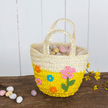Load image into Gallery viewer, Lovely Mini Woven Flower Basket - This Easter, send the little ones off on their Easter egg hunt with a sweet woven straw basket! Available in two tones (yellow and pink), the bags are stuffed with hay-paper and colourful Easter eggs! Used as a Decorative item too.  Let's the Easter Egg Hunt begin :)      Material:  Felt, Straw     Dimensions: Length 20 cm Width 16 cm