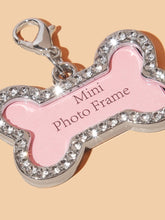 Load image into Gallery viewer, &#39;Bone Shaped Rhinestone Dog Photo Frame&#39; Adorable pendant to insert the photo of your pet friend so you can always keep it with you. Colour: Pink Pattern Type: Graphic Material: Alloy Applicable Pet: Cat/Dog
