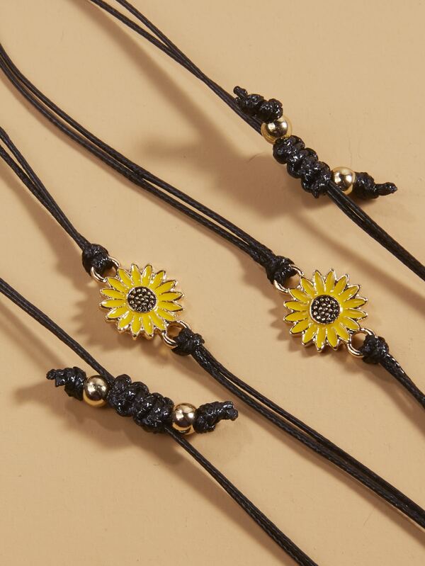 '2 Sunflowers Decor Bracelets: one for you, the other for who you love!'      Metal Color: Gold     Material: Polyester     Colour: Yellow & Brown     Style: Boho     Details: Flowers     Size: Length (20cm/7.9inch)