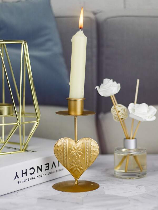 '1pc Heart Design Candle Holder' - this elegant article provide a secure and safe base for candles to avoid any mishaps. This gold coloured candle holder will make the environment stylish and will add a romanticism touch to any environment!      Colour: Gold     Type: Candle Holder     Material: Iron     Size: Length(7.2cm/2.8inch) Width (7.2cm/2.8inch) Height (12.7cm/1.1inch)     Candle included     Gift box included     Object to be used with caution.