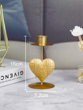 Load image into Gallery viewer, &#39;1pc Heart Design Candle Holder&#39; - this elegant article provide a secure and safe base for candles to avoid any mishaps. This gold coloured candle holder will make the environment stylish and will add a romanticism touch to any environment!      Colour: Gold     Type: Candle Holder     Material: Iron     Size: Length(7.2cm/2.8inch) Width (7.2cm/2.8inch) Height (12.7cm/1.1inch)     Candle included     Gift box included     Object to be used with caution.
