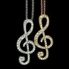 Load image into Gallery viewer, Silver colour Women Lady Crystal Silver Gold Musical Note Pendant Necklace Sweater Chain. Adorable treble clef pendant with light chain. Gift idea for musicians and music lovers. 100% Brand New Material: Alloy + Crystal Color: Silver (last available) Pendant size: About 5.5 x 2cm Necklace length: Approx 62cm Quantity: 1Pcs Package includes: 1 x Music Note Necklace, mini jewel bag and charm cloth
