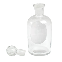 Load image into Gallery viewer, Give your bathroom a vintage feel with our apothecary perfume bottle with round glass stopper and french label. You can use it to store lotions and potions, or leave it as a decoration to give the room some Victorian character. Volume: 300ml, Material: Glass, Height: 18 cm
