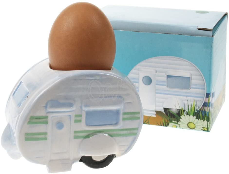 Beautifully designed ceramic egg cup part of the tableware summer collection, Caravan and camping theme. Cute table decor item and gift idea!      Material: Ceramic, High gloss finish     Dimensions: Height 6.5cm Length 9cm Depth 6.5cm Weight 0.186     Food Safe: Yes     Microwave Safe: No     Dishwasher Safe: No     Designer: Ted Smith     Gift box included
