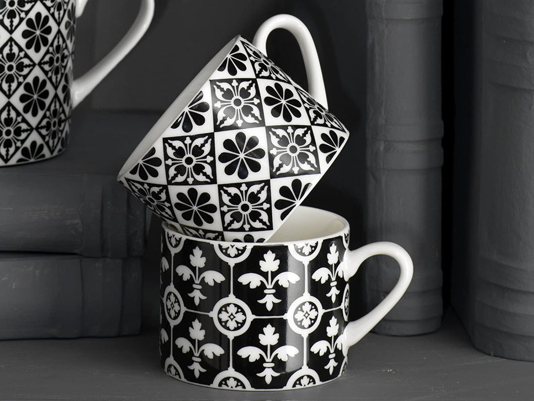 “Encaustic Tile” 4-Piece Set of Fine China Mini Mugs (Coffee espresso cups) by Creative Tops. Enjoy a hot drink with family and friends with this pretty Black and White set of 4 espresso cups, made from fine china in a combination of 2 designs, combining Fleur de Lys and petal pattern. A vintage unique product.  Presented in a stylish old gift box, making it the perfect gift for anyone who loves coffee.