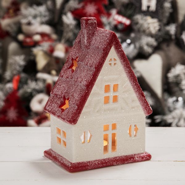 'White and Red House Tealight Holder' Beautiful, cute, winter, Christmas and warm home decor item and gift idea.  Material: Ceramic  Size: 20.5 height 13 width 9.5 d cm   Scented tealight candle included