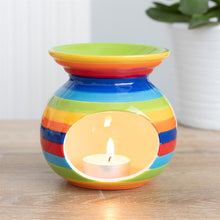 Load image into Gallery viewer, COLOURFUL RAINBOW STRIPE OIL BURNER - This ceramic oil burner with vibrant rainbow stripes can be used with both fragrance oils and wax melts to fragrance the home. Home decor item and cool gift idea. Colour: Multicolour Material: Ceramic Dimensions: H10.5cm X W10cm X D10cm Weight 342g

