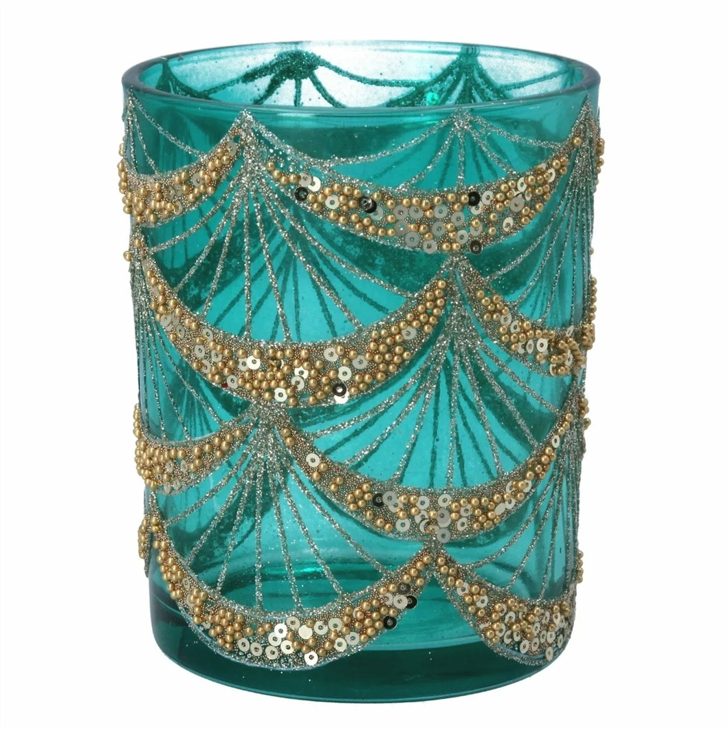 Christmas Torquoise Teal Table decor This set contains 2 charming candle holders. These stylish home decor items, which also act as glasses, give a touch of elegance to the environment. Painted in a beautiful turquoise colour, decorated with golden beads, these candle holders will not go unnoticed among your items, guests will love them! Home decor item and festive gift idea