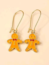Load image into Gallery viewer,  Funny couple of Christmas Gingerbread Man Drop earrings. Unisex accessory. Lovely gift idea. Festive outfit!      Metal Color: Gold     Material: Alloy     Color: Orange     Type: Dangle     Style: Glamorous Casual     Size: Eardrop Height 3.5 cm (1.4 inch ) X Eardrop Width 1.5 cm (0.6 inch)
