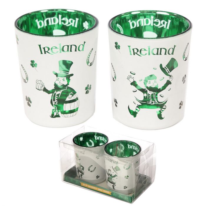 '2 pcs - Lucky Leprechaun Ireland set of 2 glass tea light votive holders' This article has a bicolour tone (white and green) with a lovely design. It is a perfect gift for St. Patrick's day lovers'.      Material: Metallic, Glass     Number in Set: 2     For Use With: Tea Light or Votive Candle     Candle Included: Yes     Dimensions: Height 6.5cm Width 5cm Depth 5cm