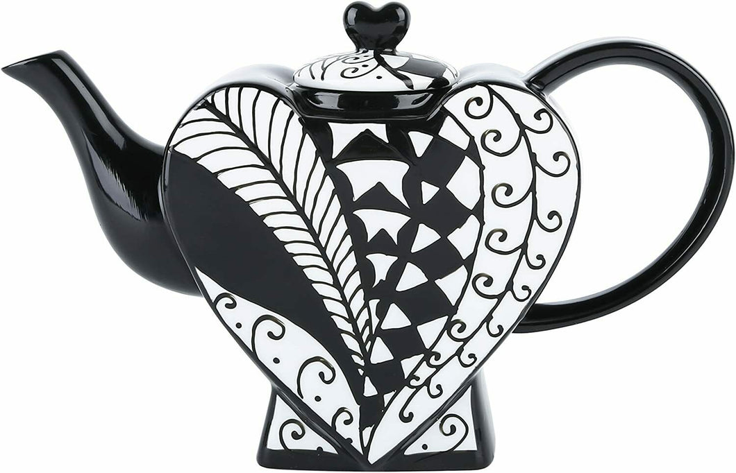 What a beautiful Heart Shape Teapot! When you want to enjoy a Coffee with your friends, show this stylish Black and White teapot. Perfect for a Tea party. Some lovers use it as a Saint Valentine's present! Unique gift for tea lovers and Alice in Wonderland's Queen of Hearts fans. For wedding favours, write to info@rovistella.com      Material: ceramic     Features: Dishwasher Safe     Condition: new, antique style