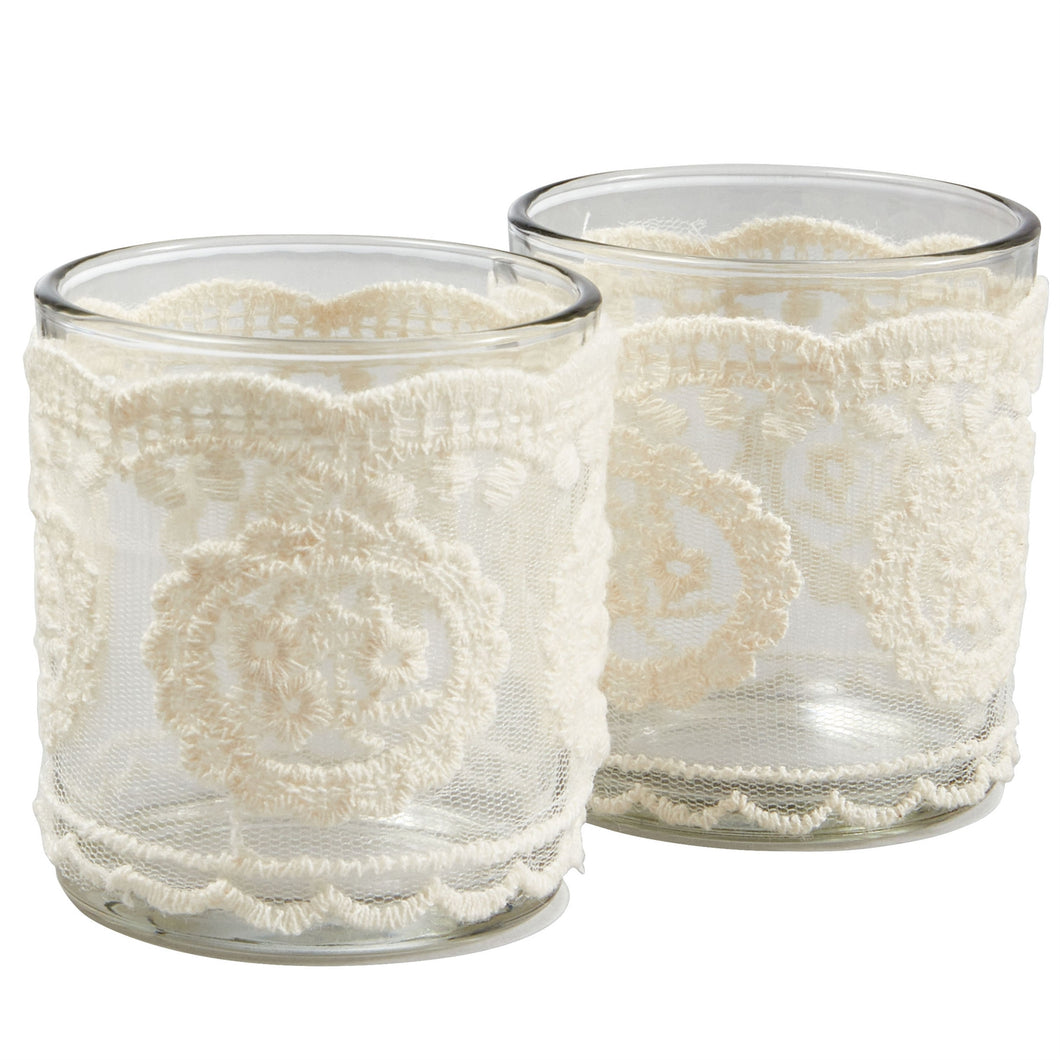 'Set of 2 white cream lace candles holders' - This collection of glass candles holders will look stunning in any home decoration or centerpiece for your table. Effects and finish: Lace. Tealight scented candles included.