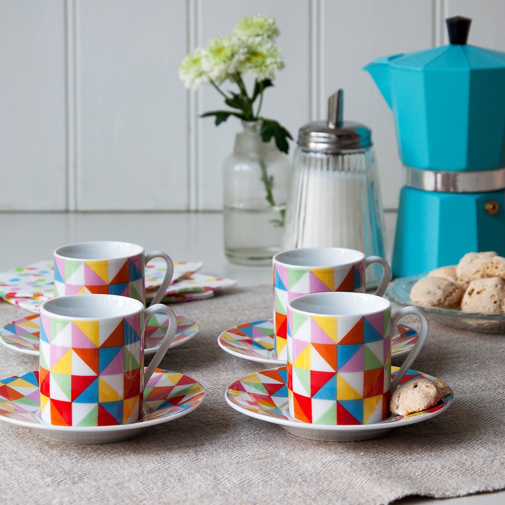'Is your kitchen in need of a splash of colour but cannot decide which? Bring a bit of multi-coloured maths to your kitchen with these 4 funky Espresso cups and saucers in Geometric design. Your guests will be impressed by the beauty of these cups!'  Made from super white porcelain, Saucer diameter:11.6cm Cup upper diameter: 5.2cm Cup Height: 5.9cm Microwave and Dishwasher safe Material: Porcelain Dimensions:      Length: 13.5 cm     Height: 11 cm     Width: 15.5 cm