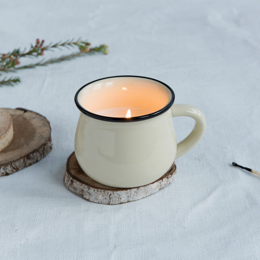 '2 pcs / Set of 2  gorgeous lime and bay-leaf scented candles, presented in an ivory ceramic mug. This stylish candle will fit right in to your kitchen or living room - plus it smells great too. When the candles are all burned out, carefully remove any residue and wash the cups thoroughly, ready to drink your favourite drink!''      Approx. burn time: 30 hours     Also available in blue and mint green.     Material: Card, Ceramic, Palm Wax