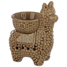 Load image into Gallery viewer, &#39;Oriental Ceramic Llama Oil Burner&#39; - to be used with a essential oils. This is a low-tech and inexpensive way to add beautiful aromas to your home.    Material: Ceramic Suitable for Use With: Water and oils. Dimensions: Height 13cm Width 11cm Depth 7cm Candle Included: No Oils Included: No Safety Information: Always read and follow the instructions that come with this product. Use a good quality standard tea light and do not overfill the dish.  Product to be used with care and caution.

