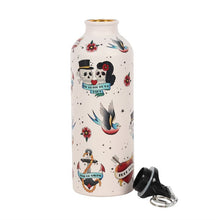 Load image into Gallery viewer, TATTOO METAL WATER BOTTLE Ditch the plastic and instead try this lightweight, reusable metal water bottle. Inspired by traditional tattoo styles this bottle features skulls, anchors and swallows for a bold and alternative style. Exclusive to us at Something Different and part of our &#39;Tattoo Parlour&#39; collection. Aluminium  Height 21.7cm x Width 6.9cm x Diameter 6.9cm  Cool colourful sailor and pin up style
