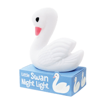 Load image into Gallery viewer, Relax in company of this adorable Little Swan night light, a perfect accessory for peaceful sleep in a sweet dream night. Put it on the bedside table or in a place where you need a soft light. Beloved article both children and adults as this swan has a nice and elegant style at the same time.      Requires 3 x LR44 batteries (included)     WARNING! Choking hazard; not for children under 3 years old     Material: Plastic     Dimensions: Length 11 cm Height 12.5 cm Width 7.5 cm
